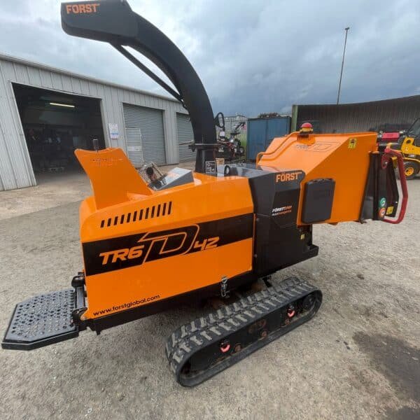 Orange Forst TR6D tracked wood chipper outdoors