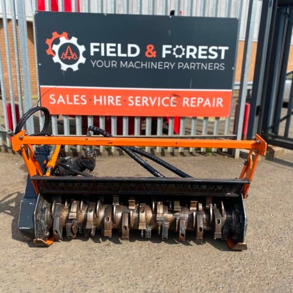 Forestry mulcher attachment outside machinery yard
