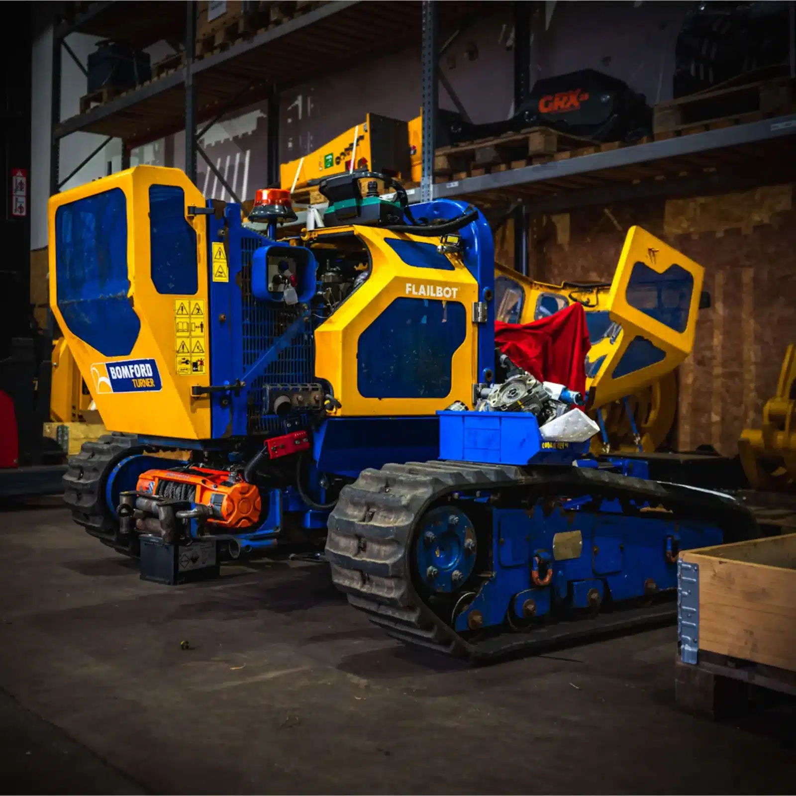 Bomford Turner Flailbot tracked mower in a machinery workshop